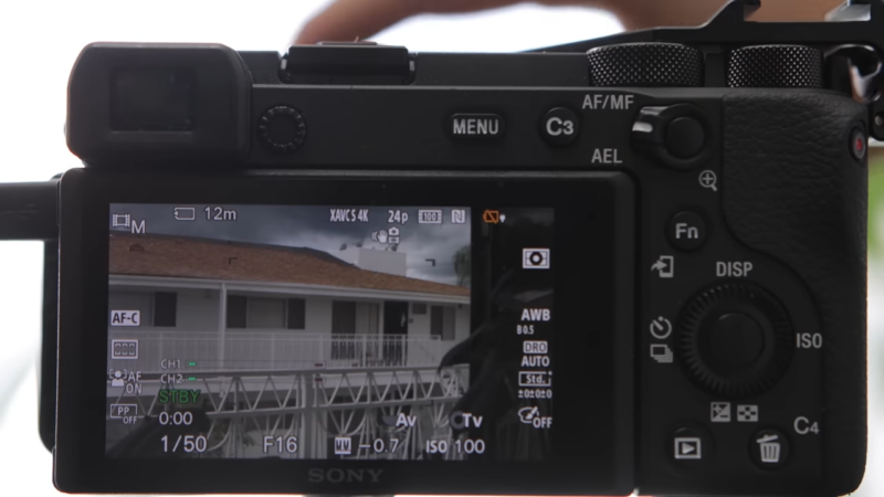 A Close-Up View of A Sony Camera Screen Showing Settings, Including ISO Adjustments