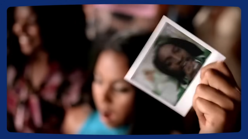 A Person Holding a Polaroid Photo